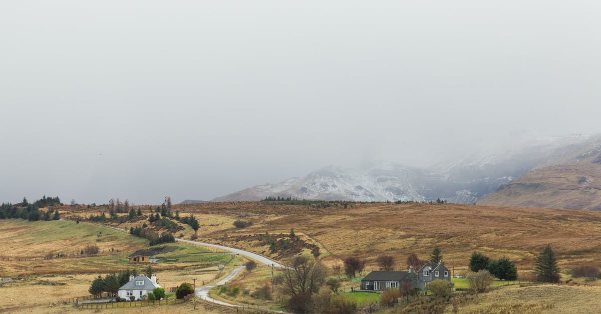 Multiple entry visa to UK (sponsored visitor) - Brown and Gray Concrete Building Under White Clouds