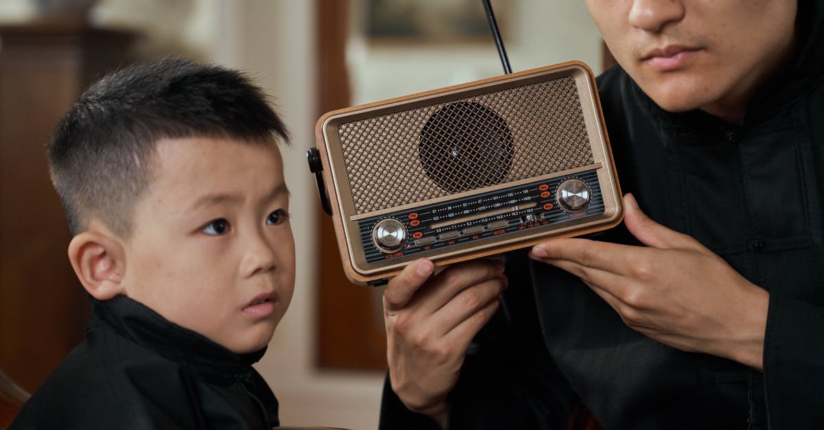 Multiple-entry visa living duration [closed] - Father and Son Listening to Radio with Attention