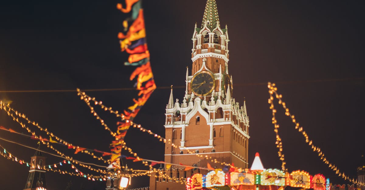 Multi-year travel medical insurance for Russian multi-year visa - Colorful luminous fairground against Kremlin on Red Square at night