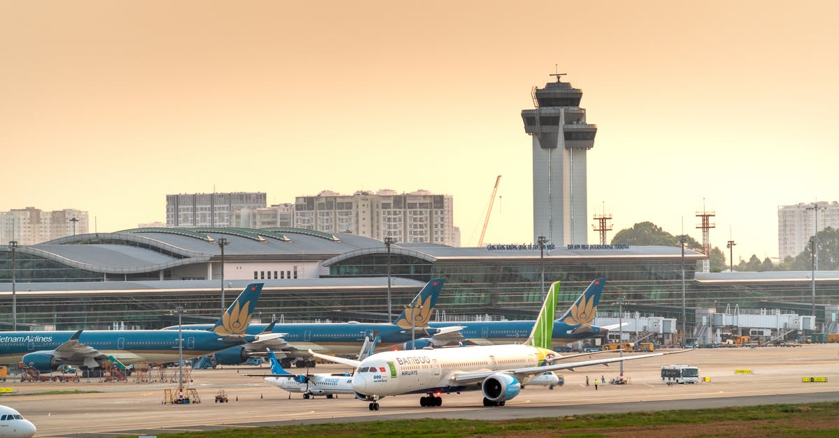 Munich Airport to Manching - White and Blue Passenger Plane on Airport