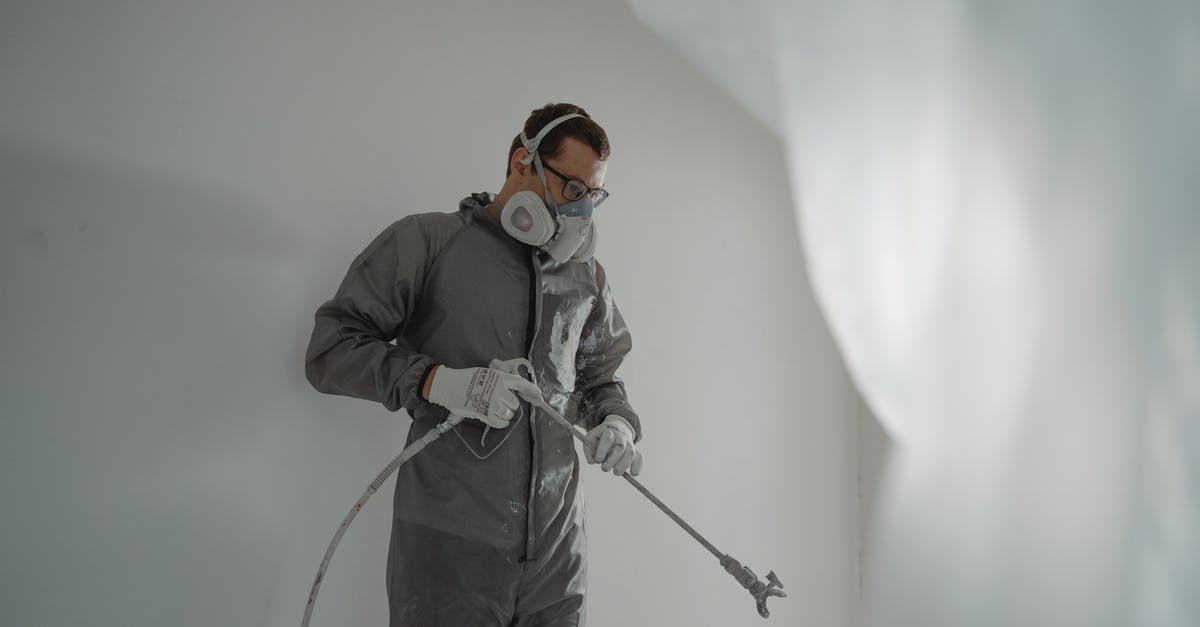 Musée d'Orsay renovation of Impressionist Gallery - Man in Black Jacket and Pants Holding Black and White Stick