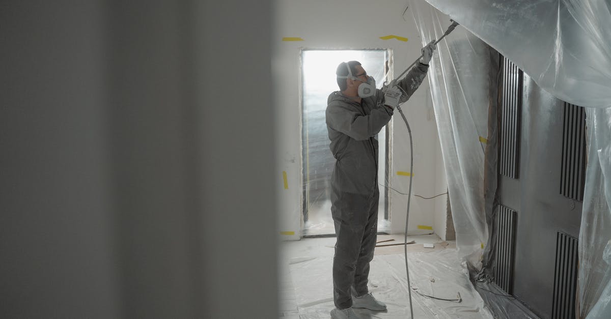 Musée d'Orsay renovation of Impressionist Gallery - Man in Black Jacket and Gray Pants Holding Black and Gray Camera