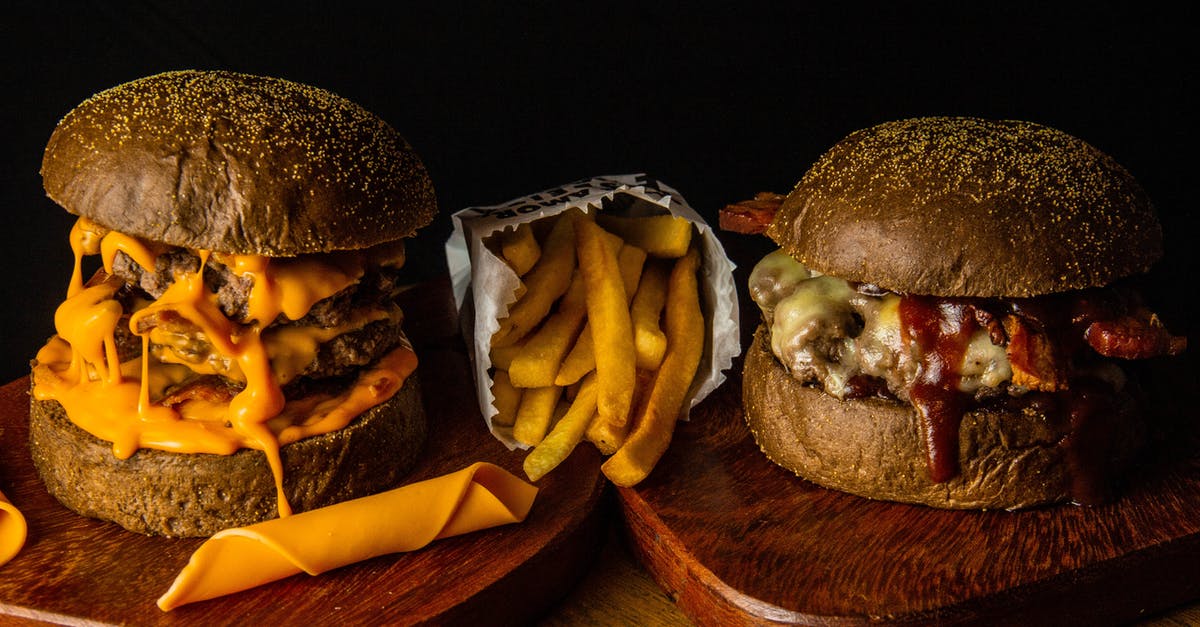 Mushroom grilled sandwich in Budapest - Two Burgers With Fries and Sauce