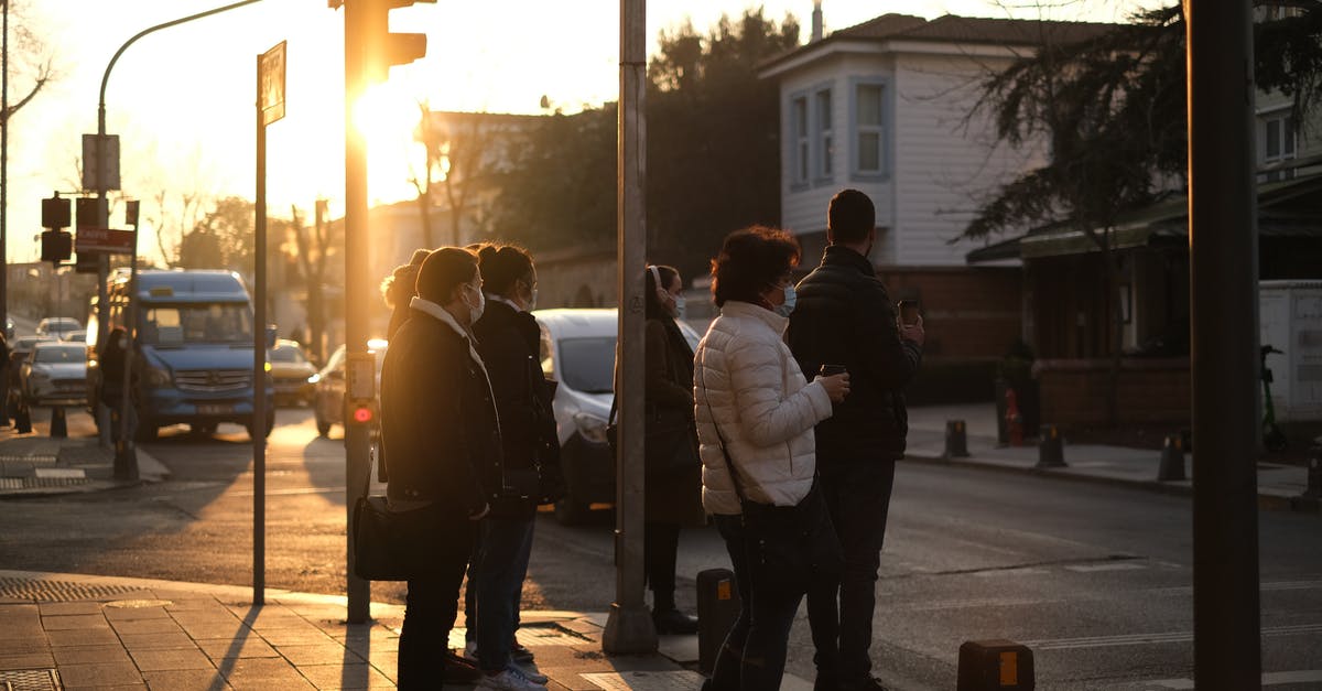 Must drivers stop at zebra crossings / crosswalks in Michigan? - People standing near crosswalk in city