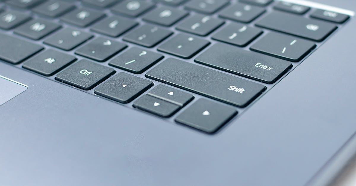 Must I enter Croatia from the Schengen area? - From above closeup of contemporary portable computer keyboard with words and symbols on black keys