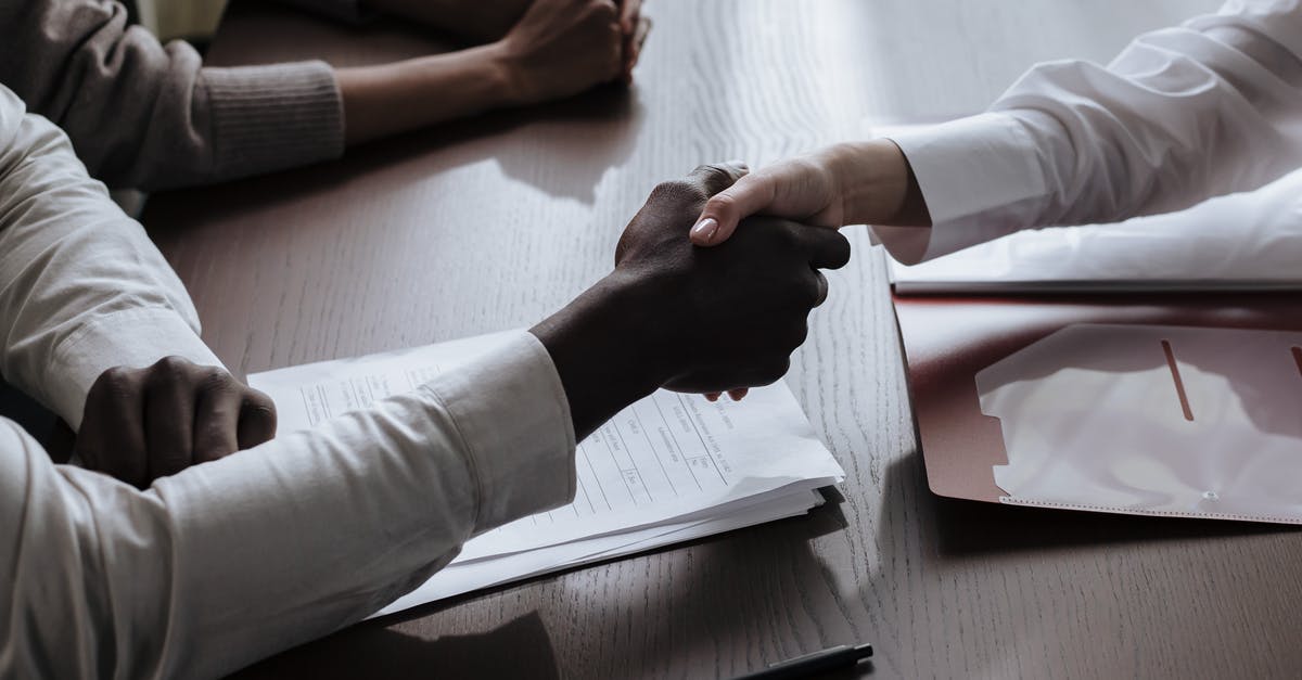 Name discrepencies between passports - Handshake Between Two People