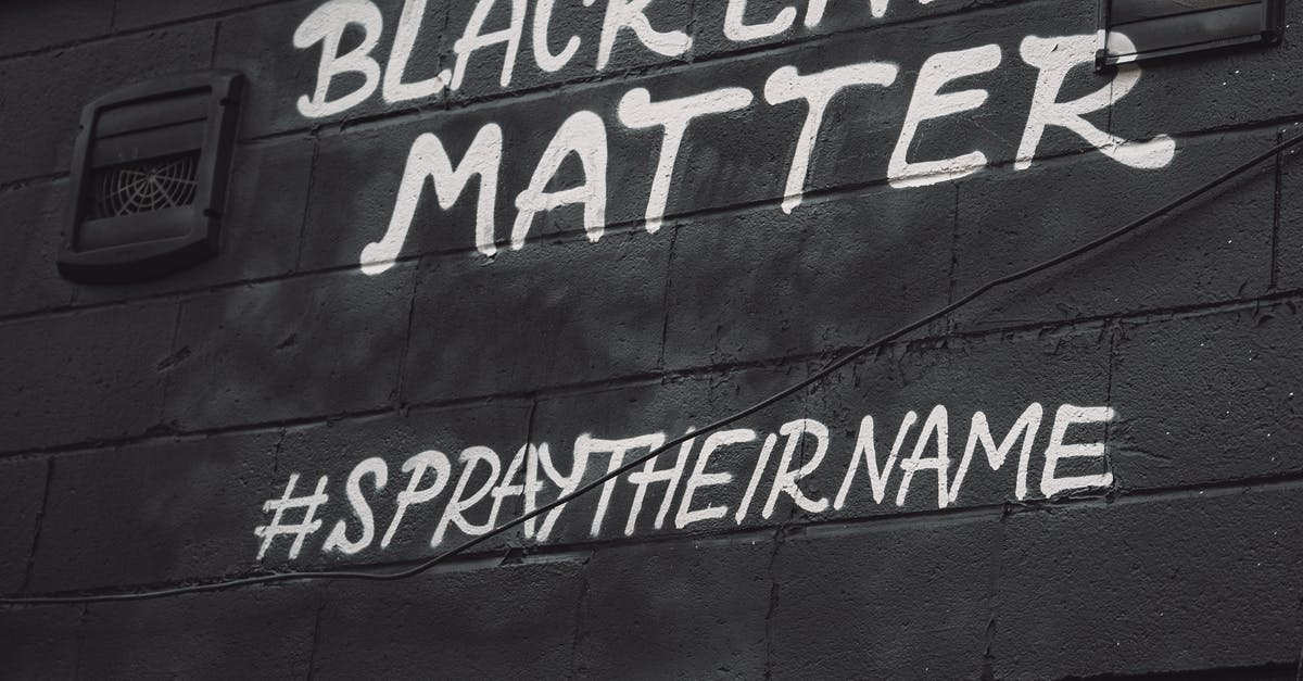 Name misspelled in visa status update notice - A Black Lives Matter Slogan Spray Painted on a Black Wall