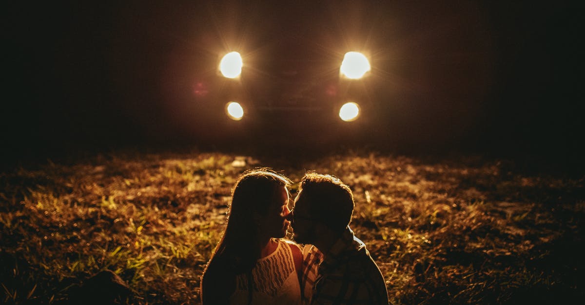 Nature trip in Germany [closed] - Romantic young couple cuddling during date in countryside at night