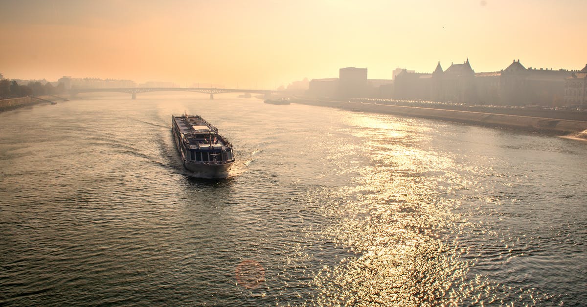 Need to travel to the USA by ship from Europe [closed] - Boat in Sea Against Sky during Sunset