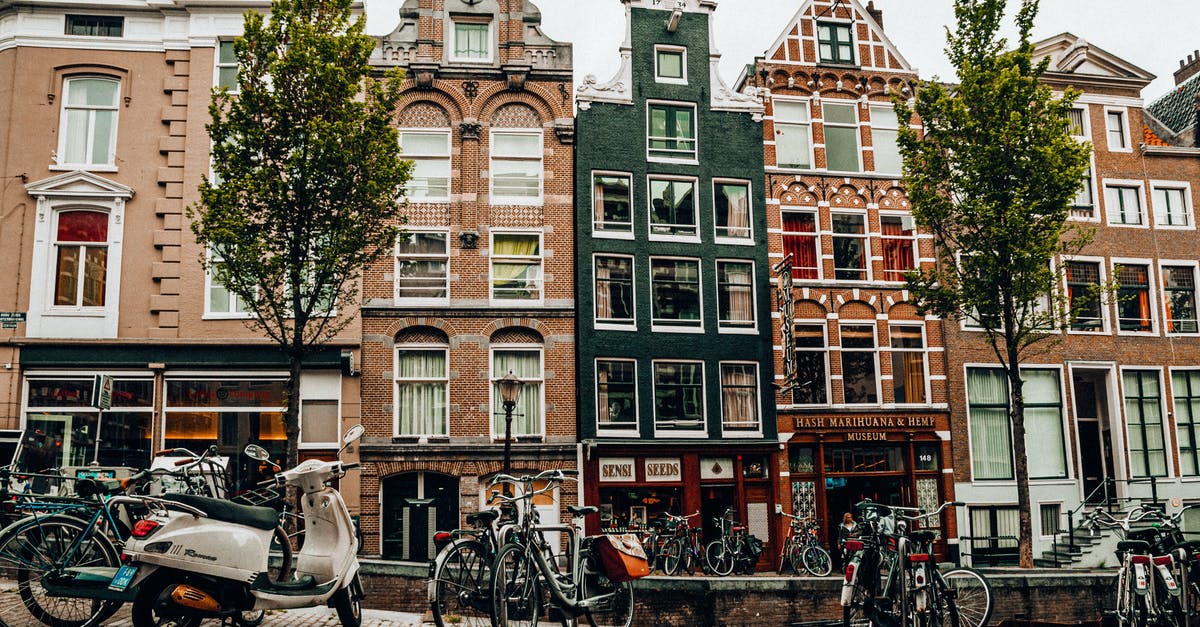 Netherlands Schengen Visa Refusal - Bicycles Parked on the Street Near the Apartment Buildings