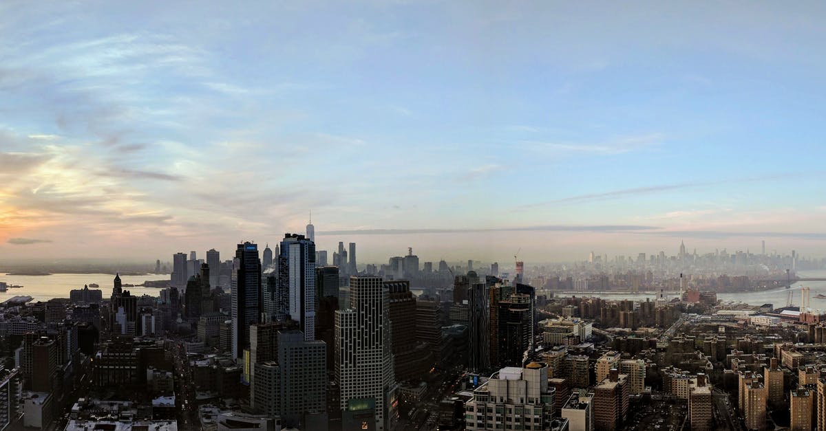 New York subway Q train - view of Brooklyn Bridge - City Buildings and Sky