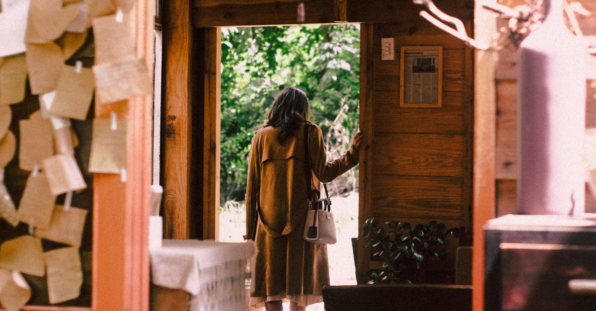 No exit stamp leaving Australia - Woman Standing Near Open Door About to Step Outside