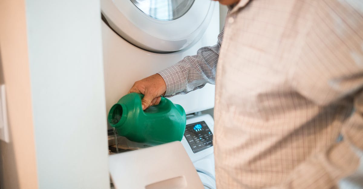 Non-biological laundry detergent available in the US? - 
A Man Pouring Detergent in a Washing Machine