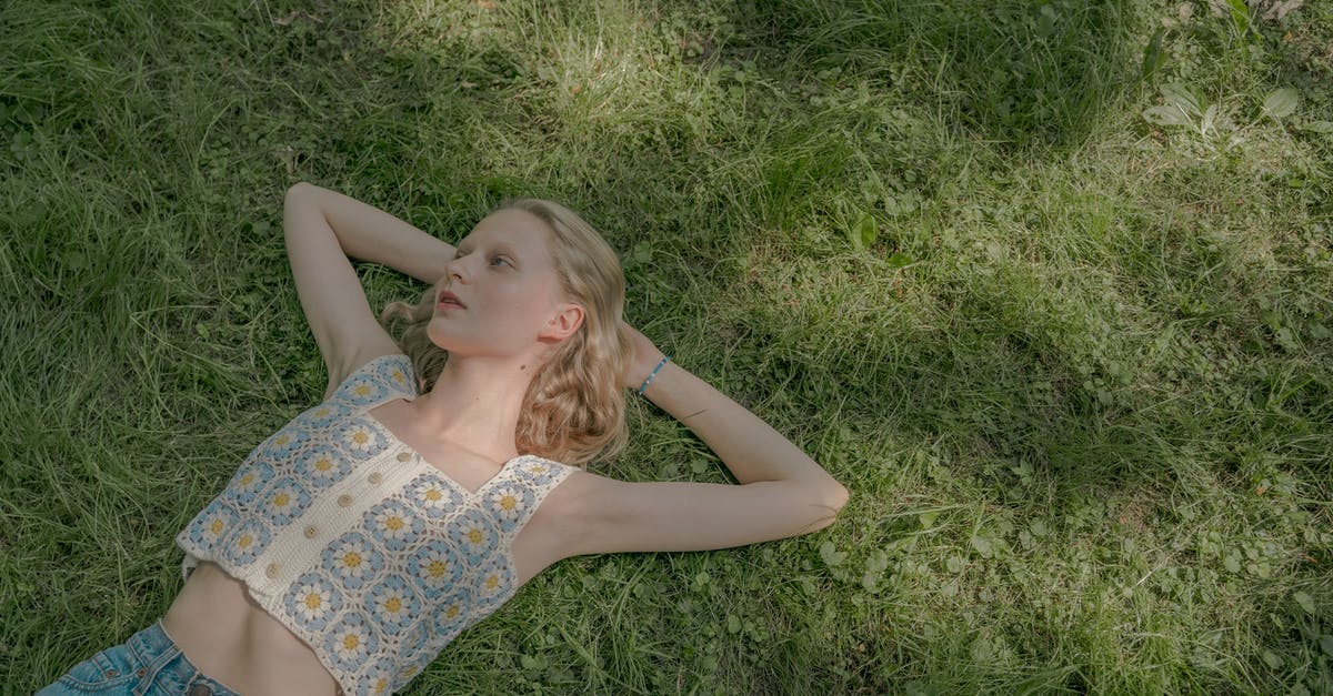 Non-commercial long 7 day retreats in Japan? - Blond Young Woman Laying on Lawn on Summer Sunny Day