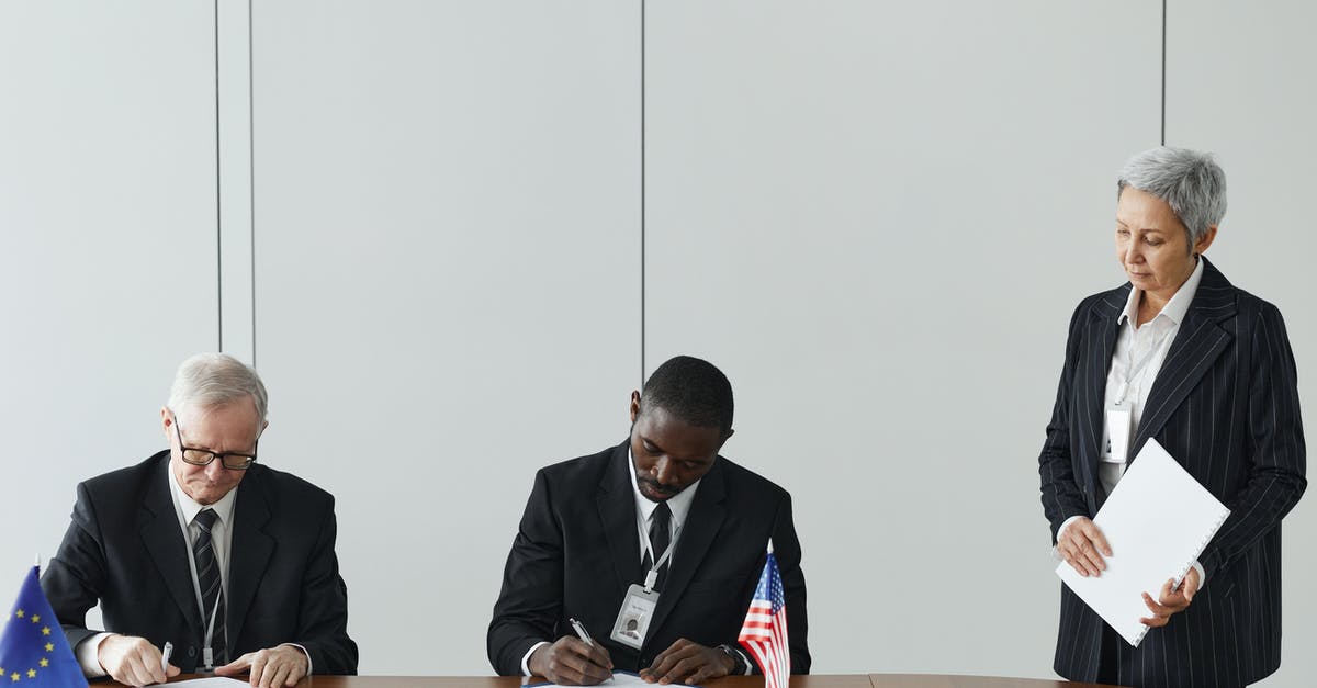 Non-EU citizen working in EU state, can I marry EU national living in another EU state? - Man in Black Suit Sitting Beside Man in Black Suit Non-EU citizen working in EU state, can I marry EU national living in another EU state? - Man in Black Suit Sitting Beside Man in Black Suit