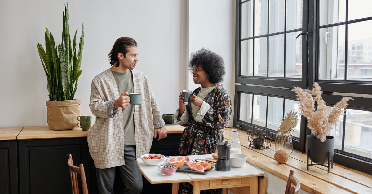 Non-Jewish American Woman Married to Israeli Man Going to Israel - Happy Couple Having Breakfast