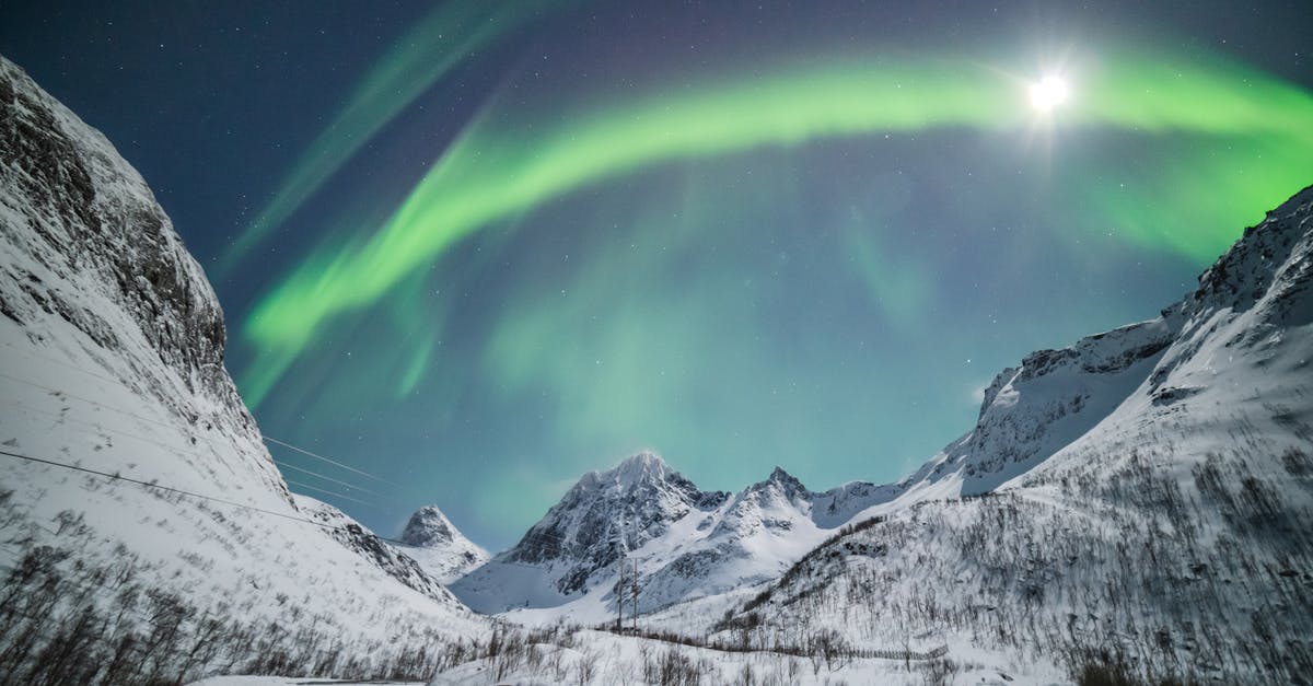 Northern Lights in Alaska [closed] - Aurora Borealis and Sun Visible in Sky of Northern Norway