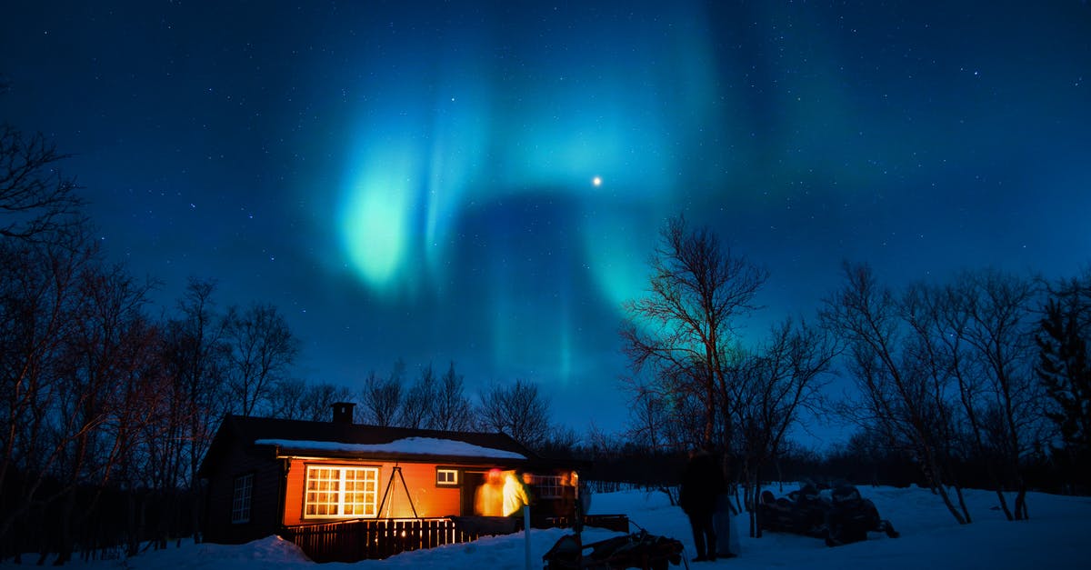 Northern lights in Europe in late December [duplicate] - Brown Cottage Under Aurora Borealis