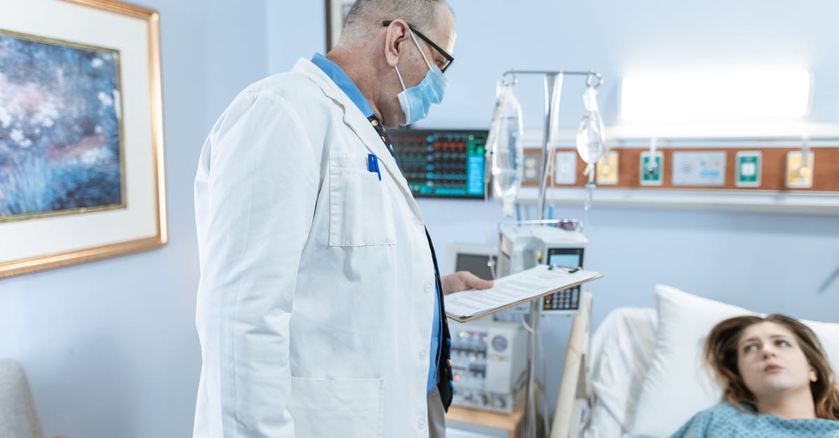 Not having a job when asking for a Schengen visa - A Physician in White Coat Checking Up on His Patient