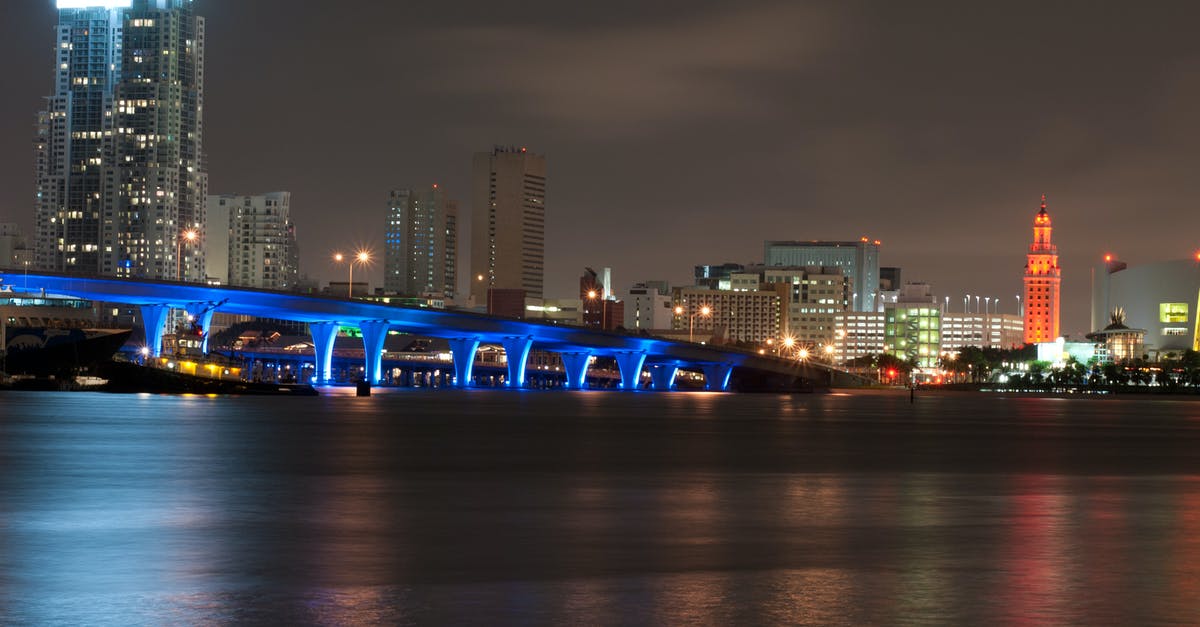 Notifying banks of travel to Florida - Bridge and Urban City at Nighttime