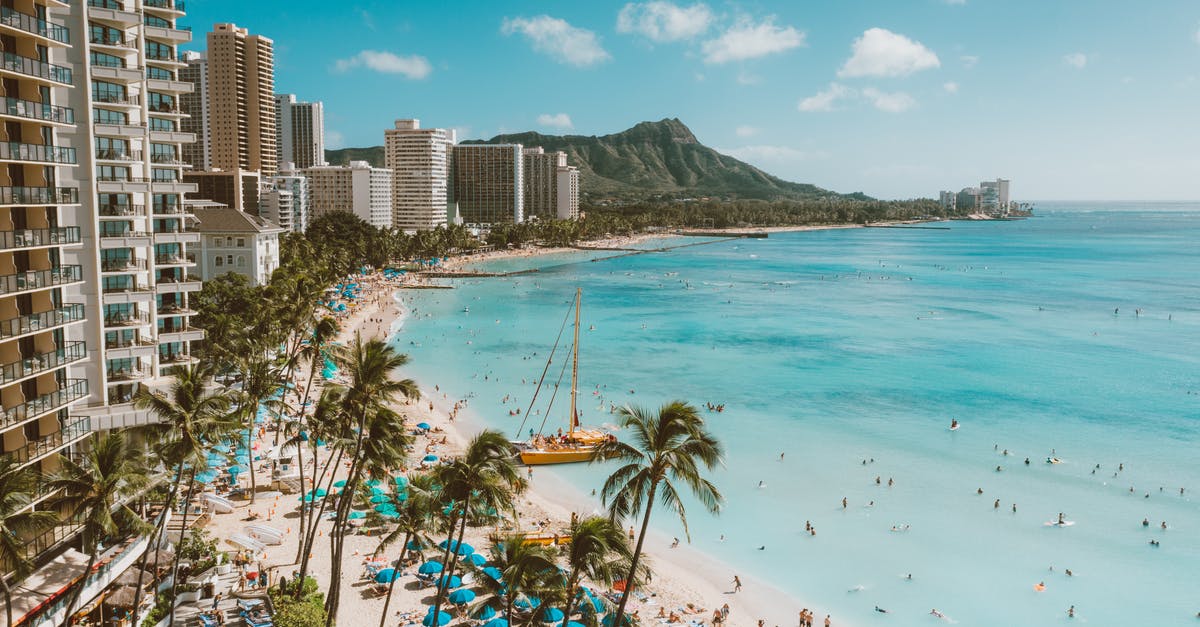 NZ to USA do we collect luggage at Hawaii transit stop? - High Rise Buildings Near Beach