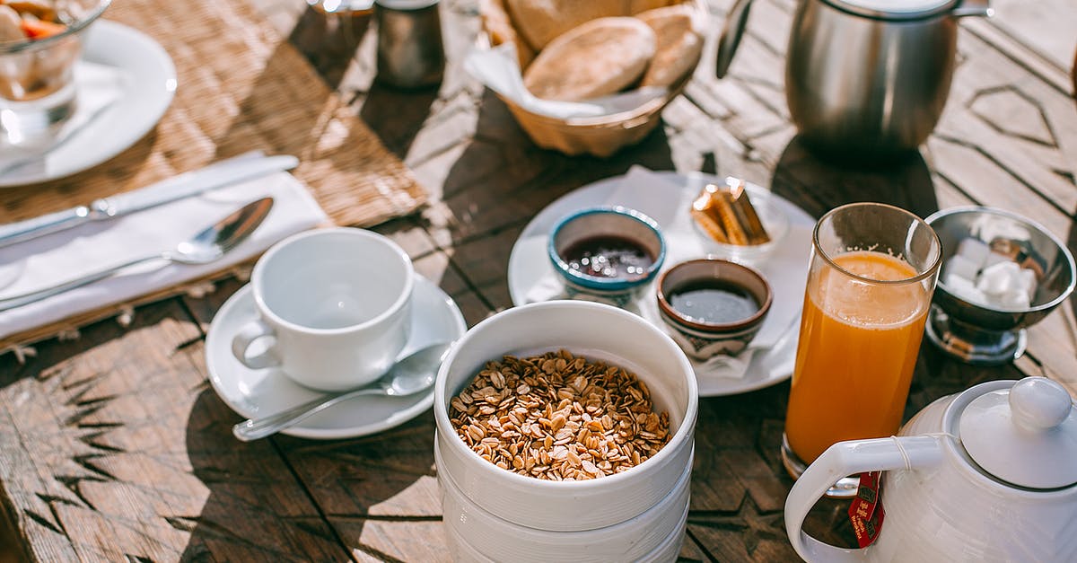 Oat Bran in Sealed Canisters - Served table with breakfast on street