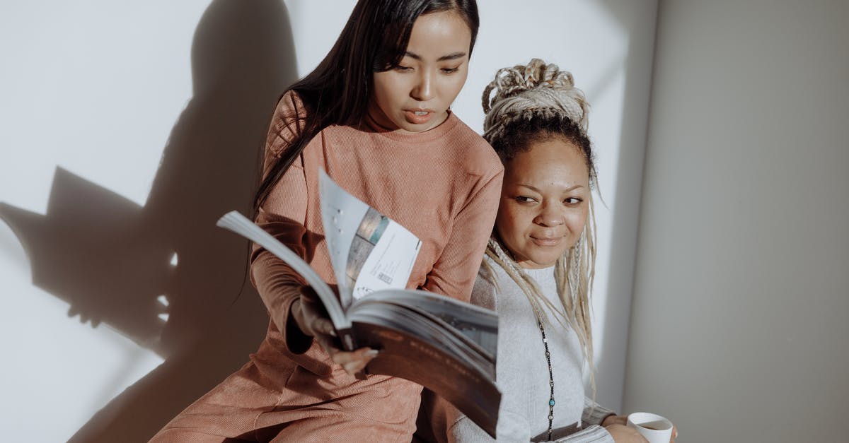 Observation Pages on Passport - Women Having Conversation while Looking at the Magazine