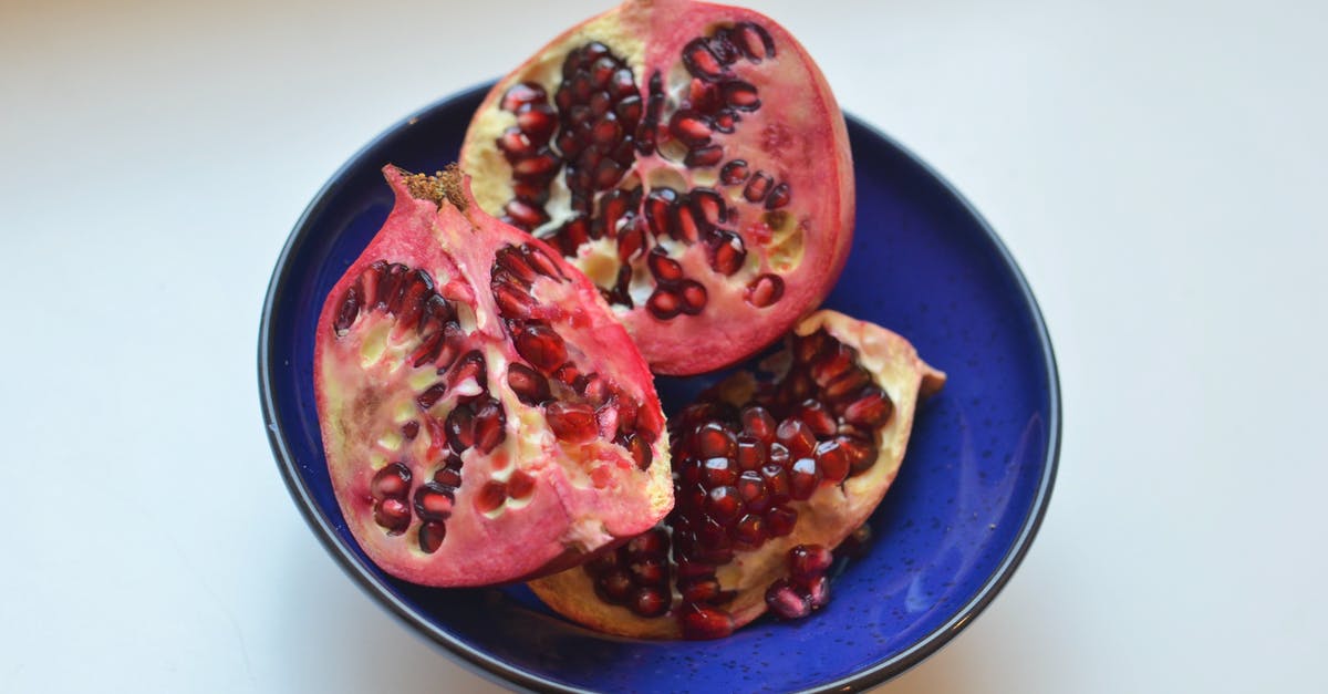 Obtaining a "Supervisa" for Canada from outside your home country? - Cut red pomegranate served in bowl