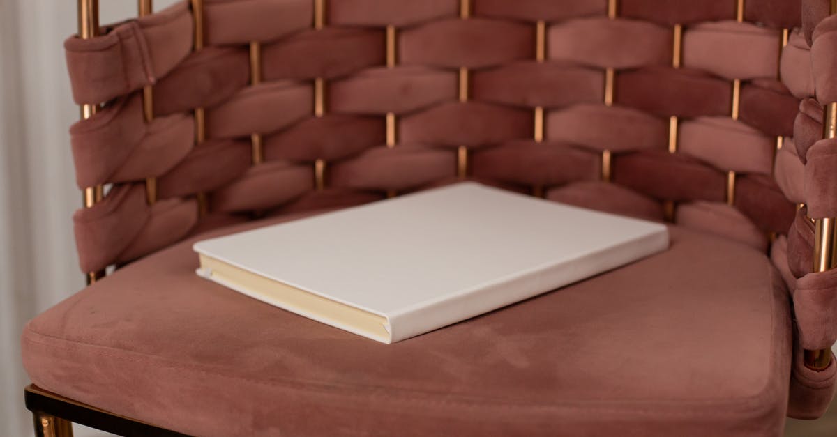 Old Marriott Gold perks after SPG/Marriott account merger - White hardcovered book placed on brown armchair