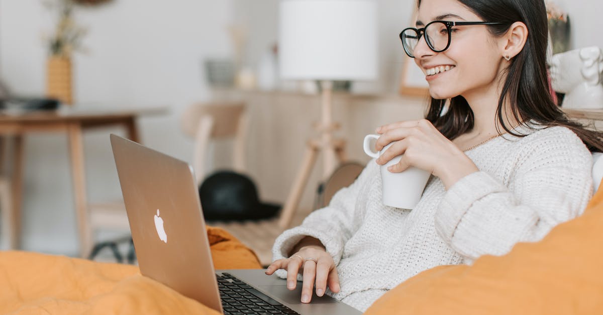 Online seat reservations with a JR-Pass - Woman Having Coffee While Using Laptop