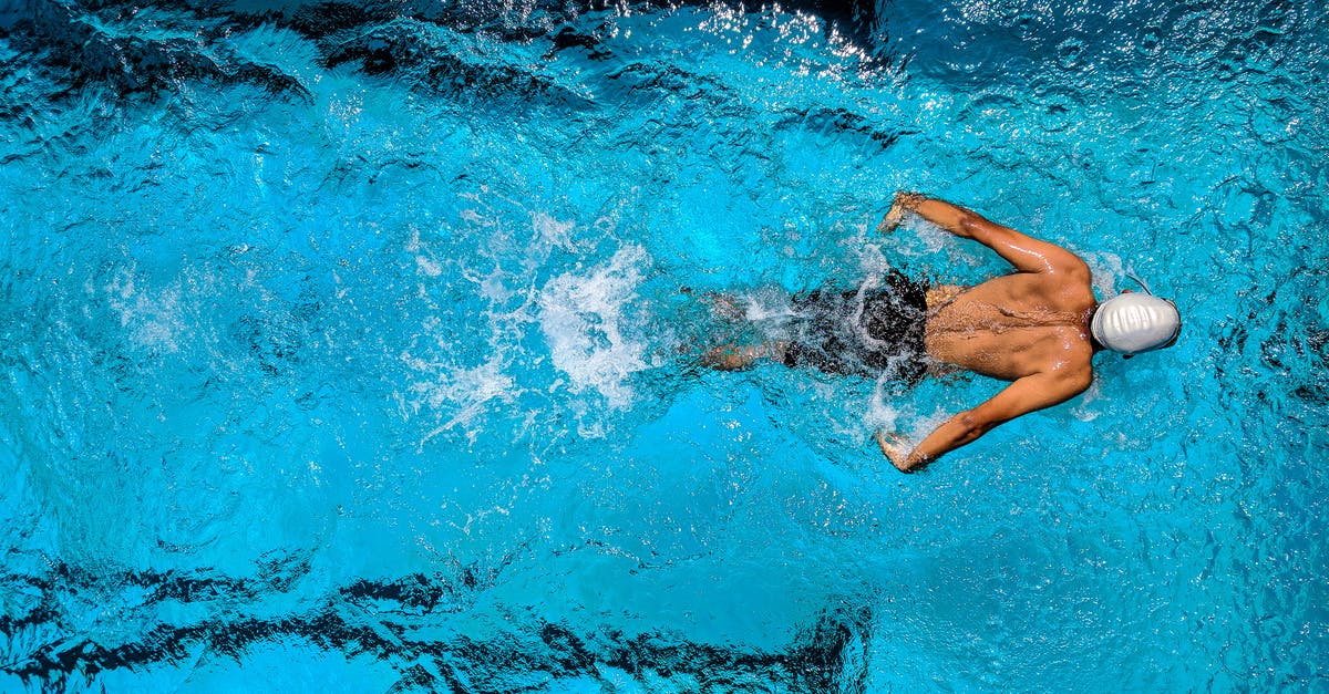 Open Water Diver certification in Malaysia in the end of January - Person Swimming on Body of Water