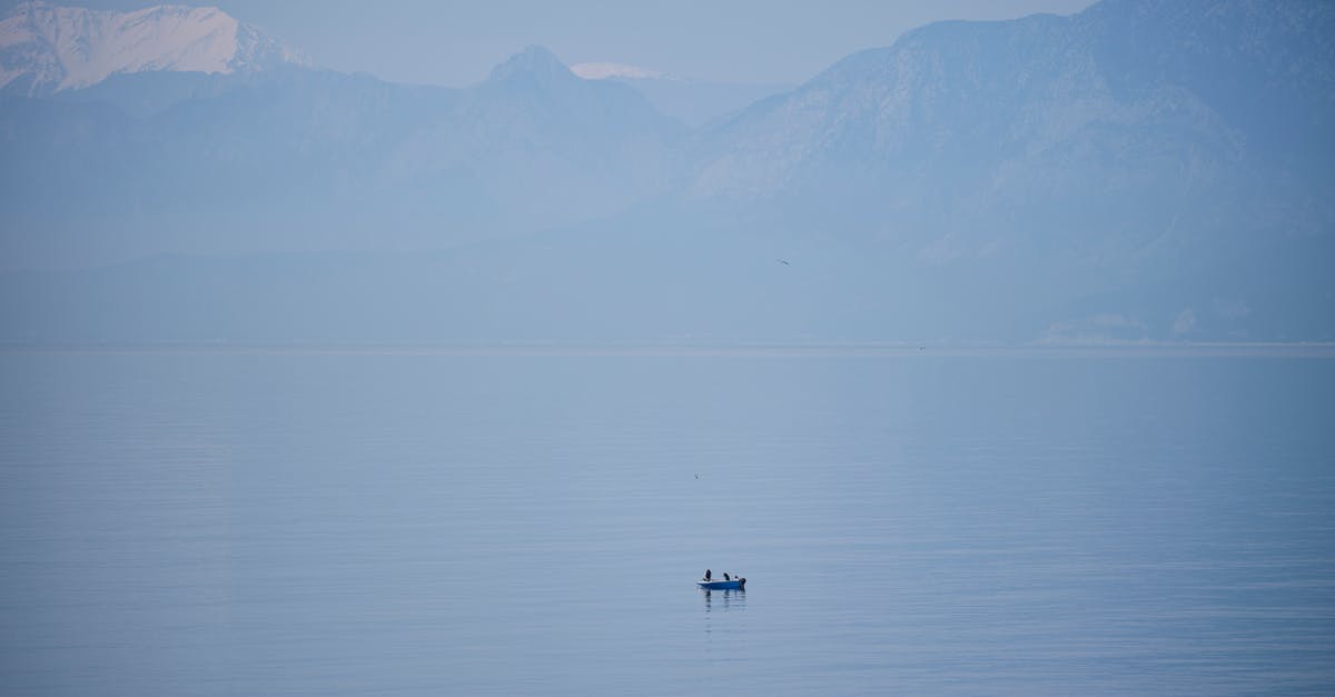 Options for getting paid for hunting or fishing on vacation - a lonely fishing boat in the middle of the sea