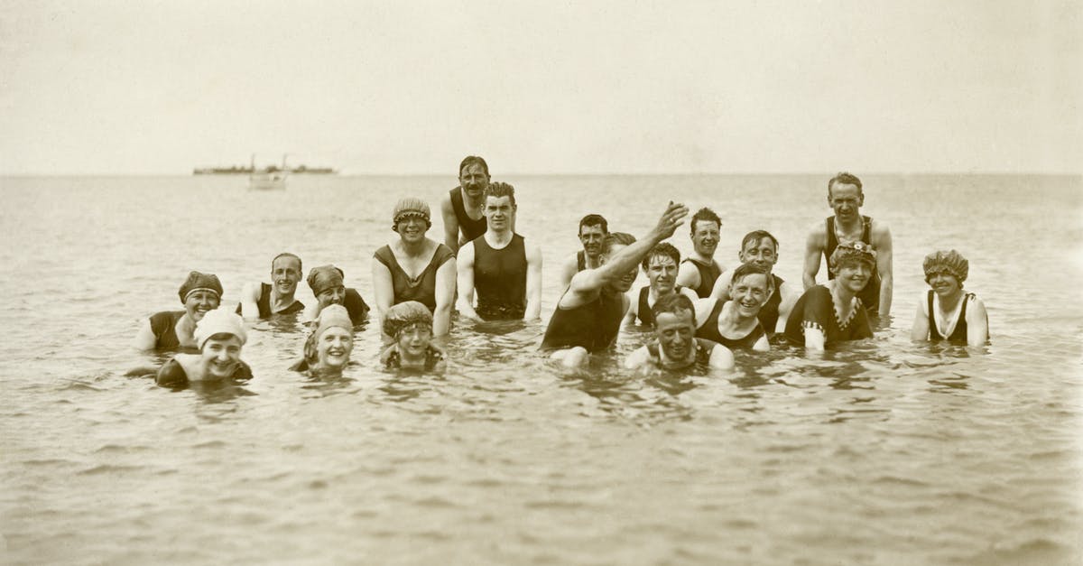 Overlapping periods of several Schengen visa [duplicate] - Grayscale Photo of Group of People on Water