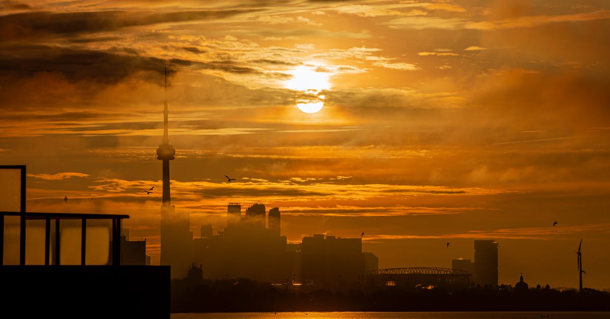 Overnight layover in Toronto as of early June 2020? - Silhouettes of Buildings in Canada During Sunrise