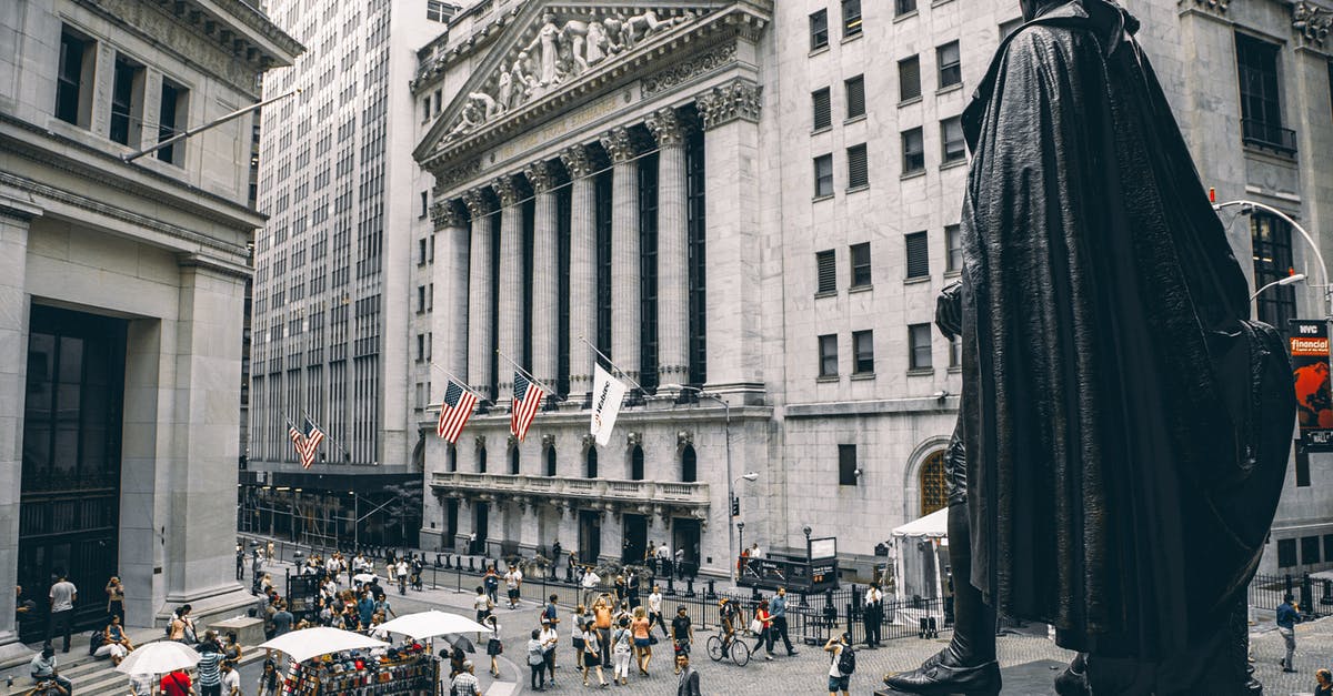 Overstay as a minor in USA. Will I get a visa again? - People Walking on Street Near Building