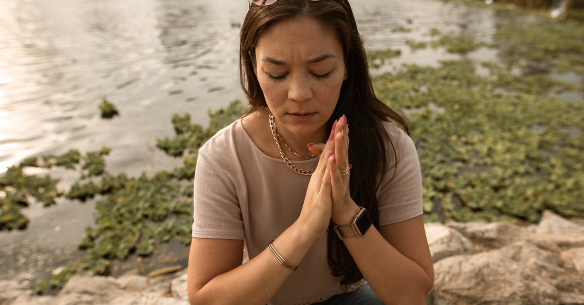 Overstay in Germany by mistake [closed] - Stressed woman sitting with eyes closed on lake shore