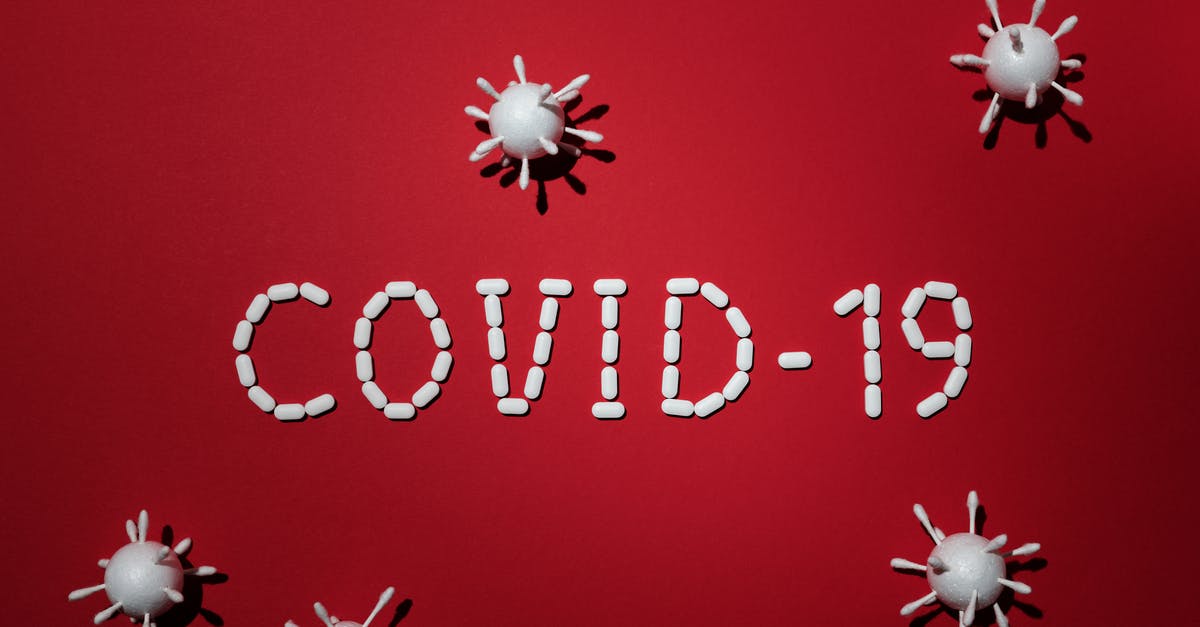 Overstaying Schengen visa due to Covid-19 infection: What are the consequences? - Covid-19 Text on Red Background