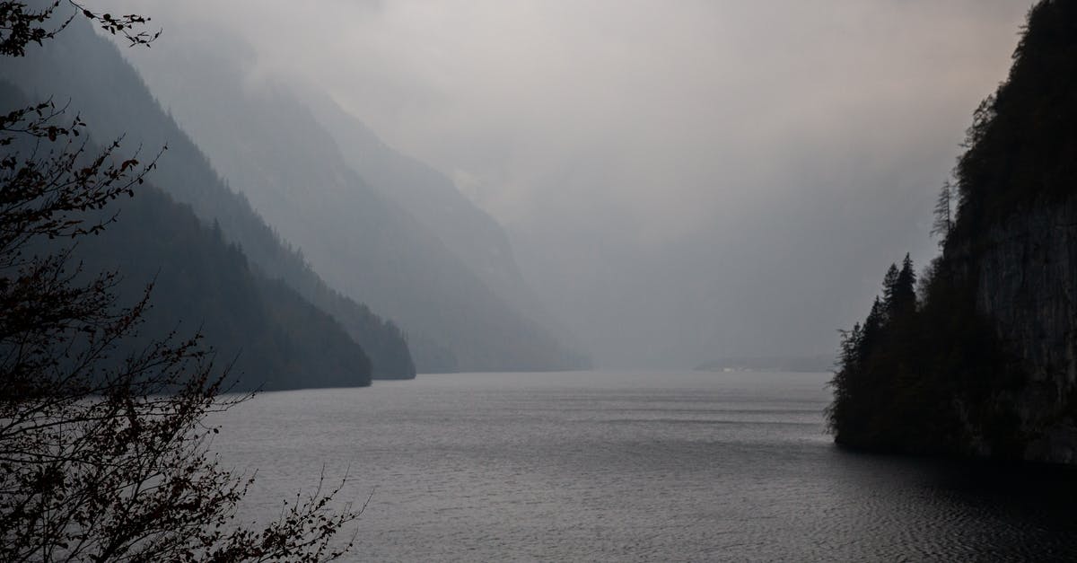 Oyster - buying travelcard after journey on same day - Breathtaking view of mountainous terrain with lake in cloudy day