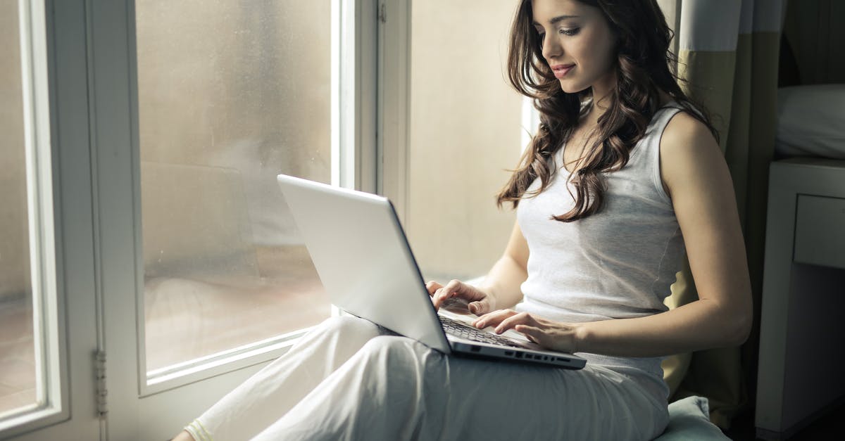 Packable pillow for side-sleepers that actually work? - Woman Wearing Tank Top Sitting by the Window 