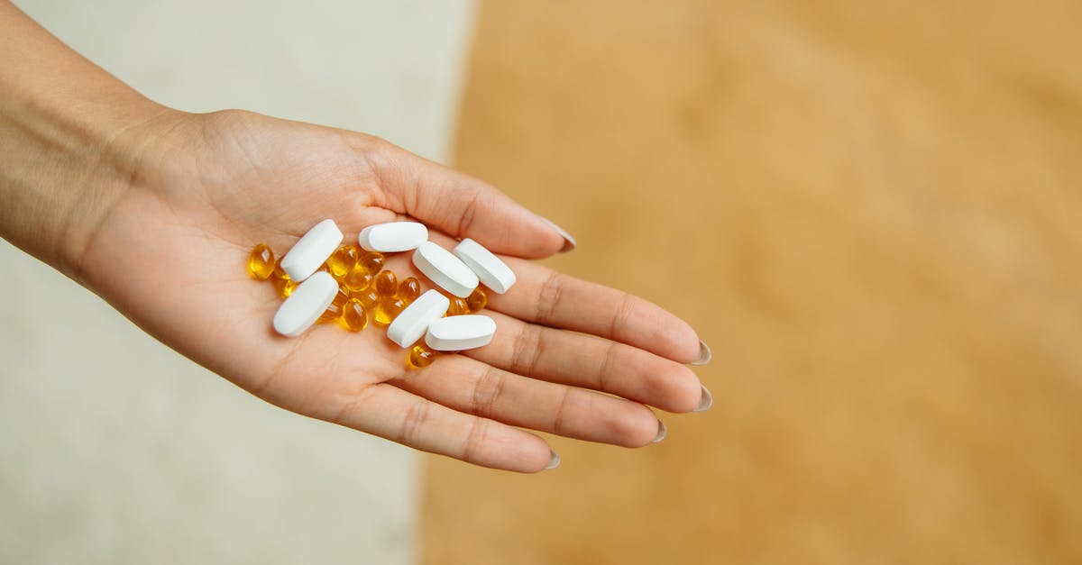 Pain management emergency in Mexico - Pills on a Person's Hand