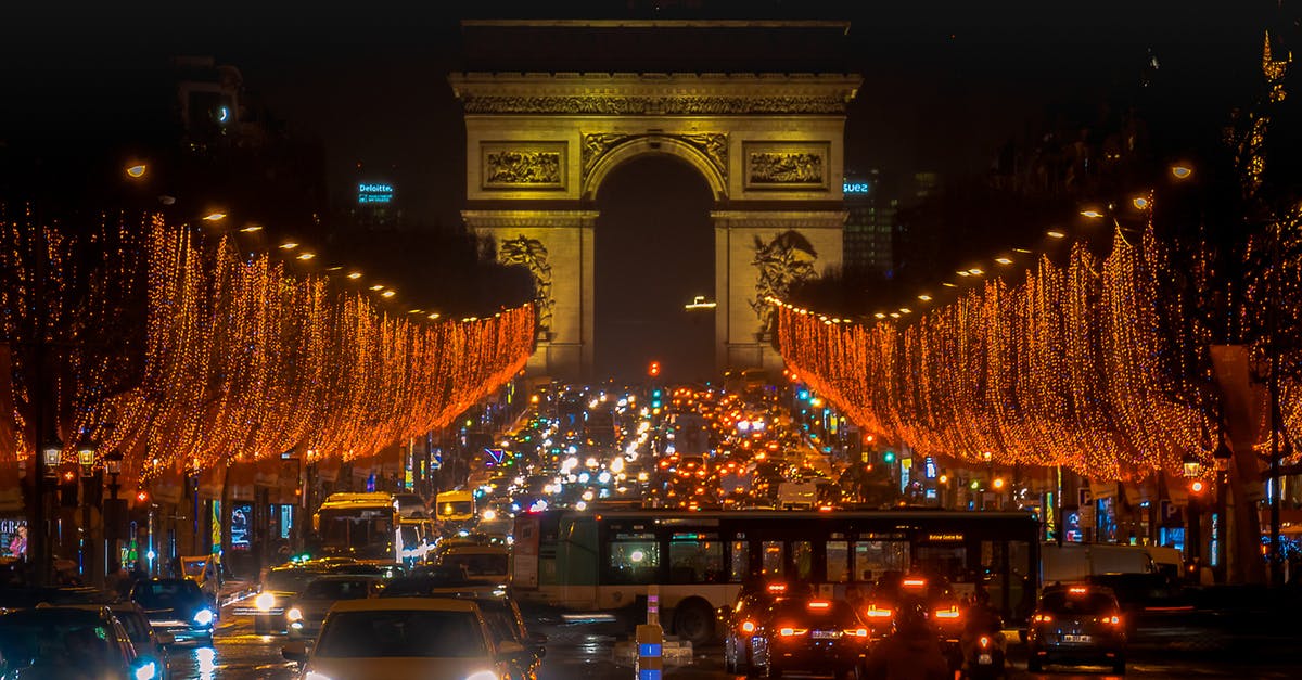 Paris in Jan Christmas decorations - Road Traffic at Night on Paris Road