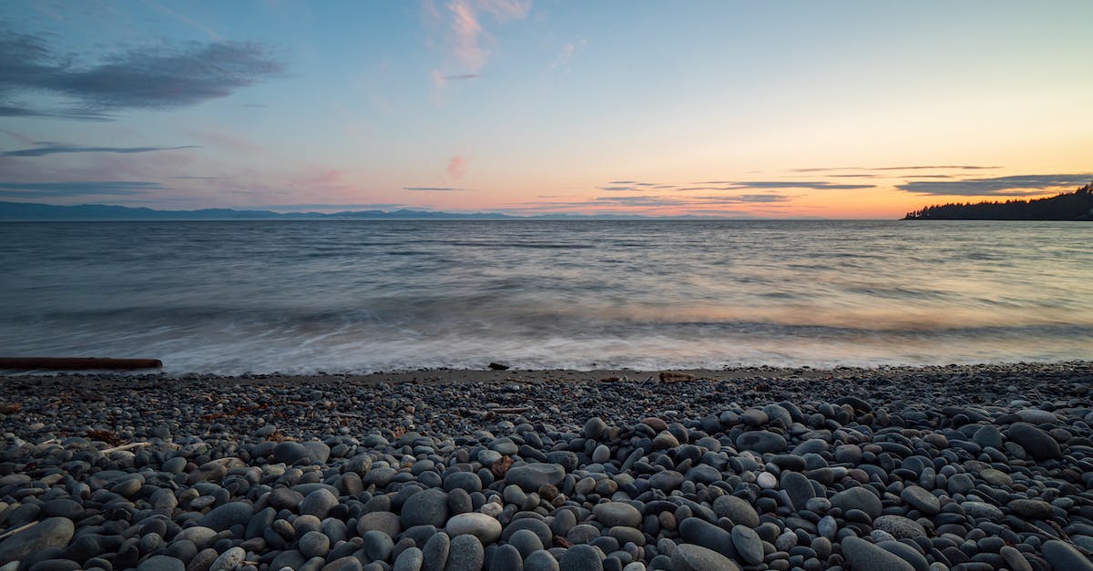 Parking for 3 - 4 days in Vancouver, BC - Stones On Seashore During Sunset