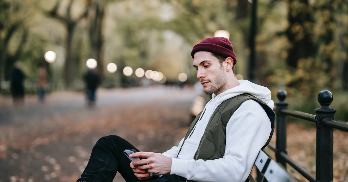 Parking via SMS in Sofia, Bulgaria - Focused young man with smartphone