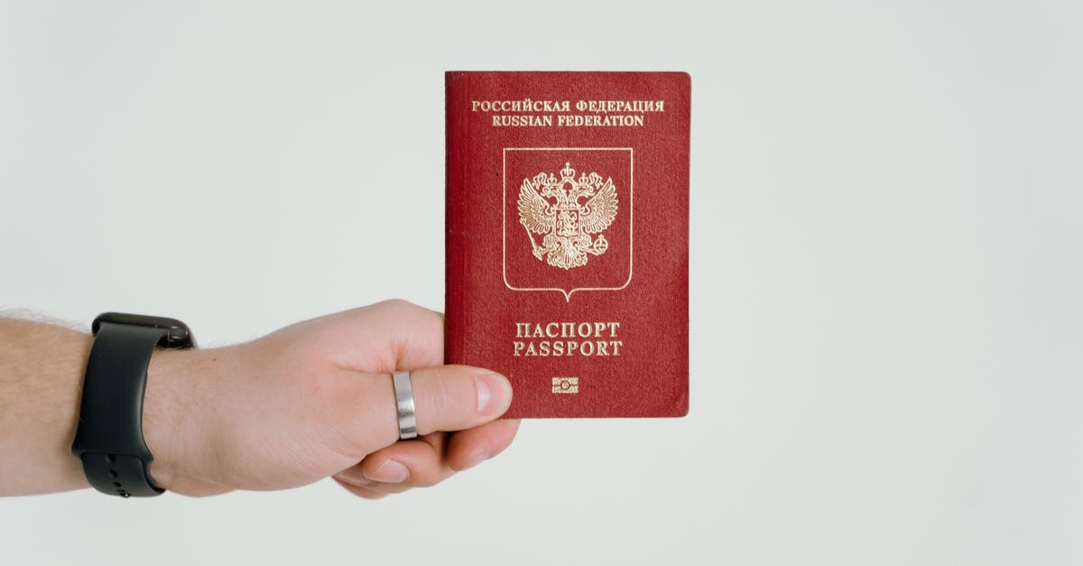 Passport expiry and holding a valid visa - Person Holding A Russian Passport