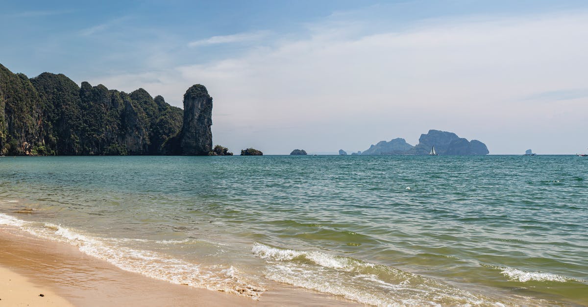 Passports Thailand [duplicate] - Brown Rock Formation on Sea Shore