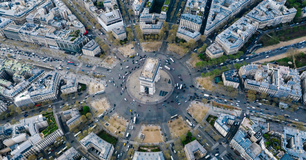 Paying an unreceived traffic fine in Paris - Arc de Triomphe Monument at the Center of the Roundabout Paying an unreceived traffic fine in Paris - Arc de Triomphe Monument at the Center of the Roundabout