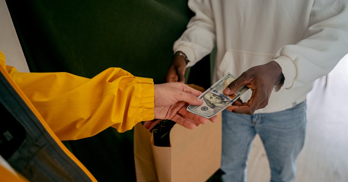 Paying cash to hotel in advance for a few days - Free stock photo of adult, banking, election