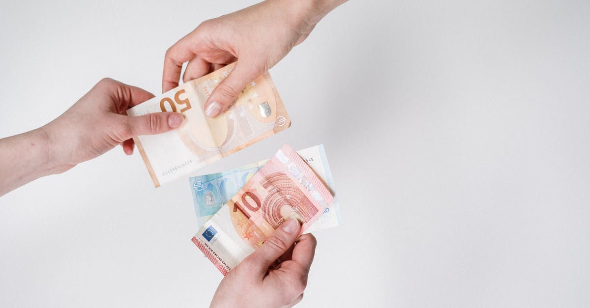 Paying with Euro in Czech Republic - Person Holding 10 and 10 Euro Banknotes
