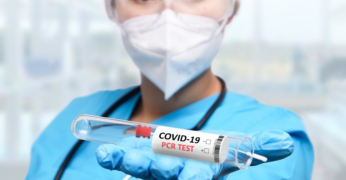 PCR test required to fly to Spain? - 
A Medical Professional Holding a Test Tube for Testing Covid-19