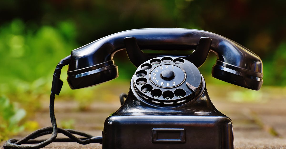 Phone calls within countries in Europe [closed] - Selective Focus Photography of Black Rotary Phone